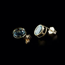 Load image into Gallery viewer, 9ct Yellow Gold Oval Blue Topaz Stud Earrings (7x5mm)
