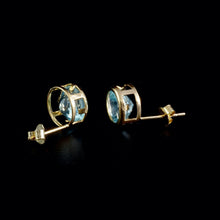 Load image into Gallery viewer, 9ct Yellow Gold Round Blue Topaz Stud Earrings (7mm)