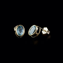 Load image into Gallery viewer, 9ct Yellow Gold Oval Blue Topaz Stud Earrings (7x5mm)