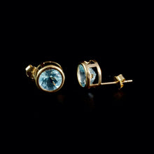 Load image into Gallery viewer, 9ct Yellow Gold Round Blue Topaz Stud Earrings (7mm)